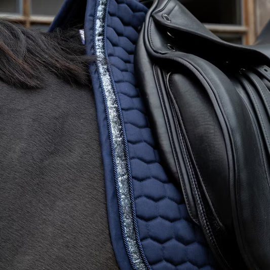 Navy glitter saddle pad on a horse