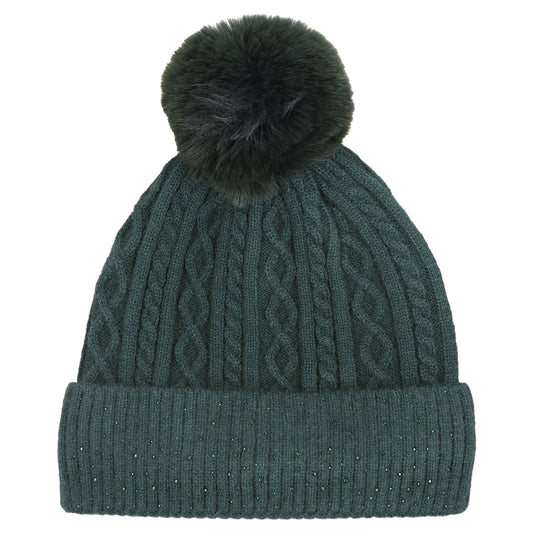 A dark green cable-knit beanie hat with a matching ribbed cuff and a fluffy dark green pom-pom on top, shown against a plain white background.
