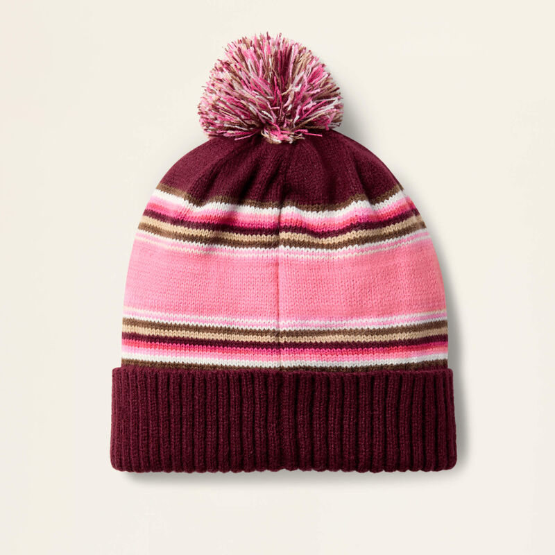Pink beanie on a beige background