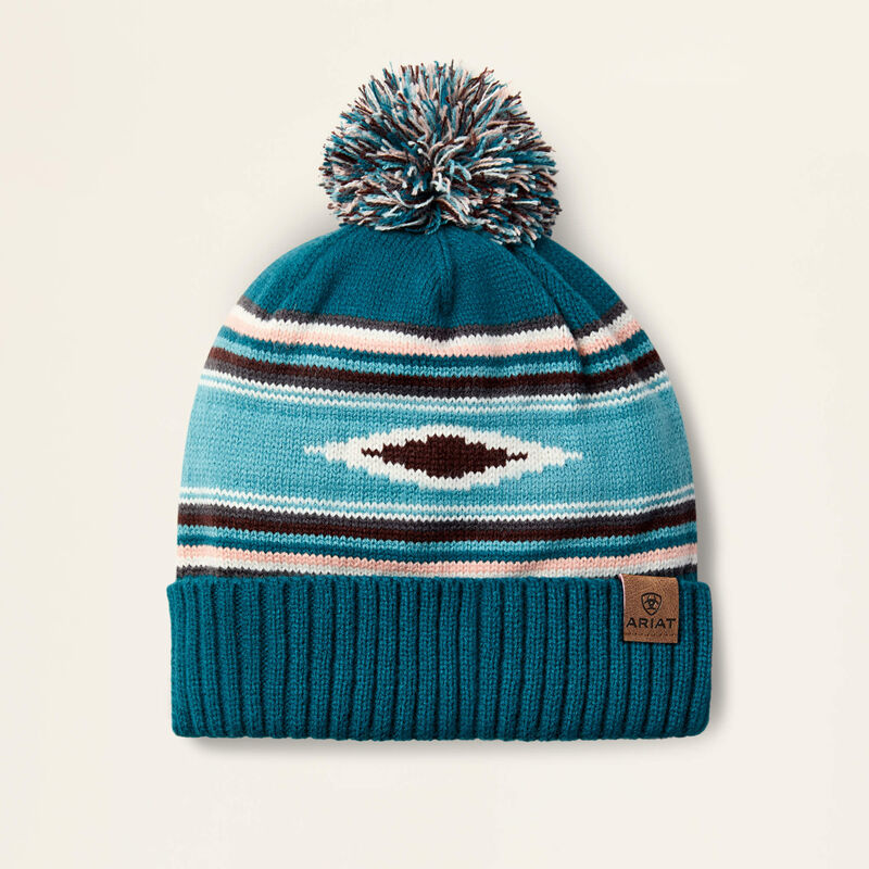 Turquoise beanie on a beige background