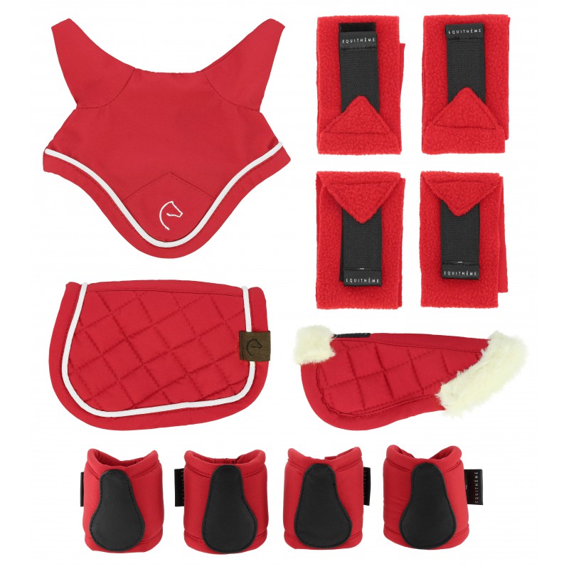 Collection of red equestrian protective gear on a white background