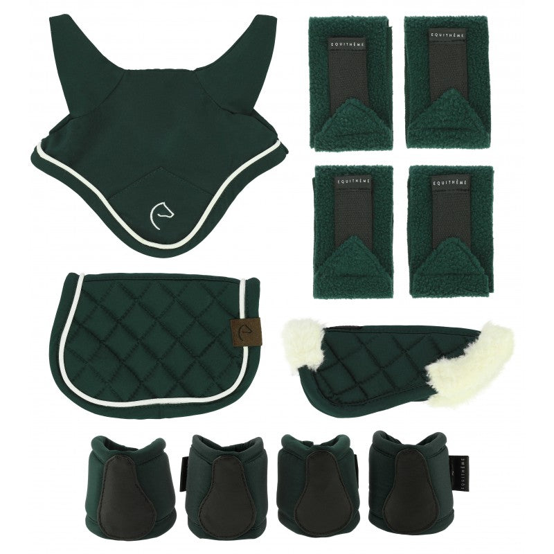 Collection of green equestrian accessories including a neck guard, saddle pad, leg wraps, and hoof boots on a white background.