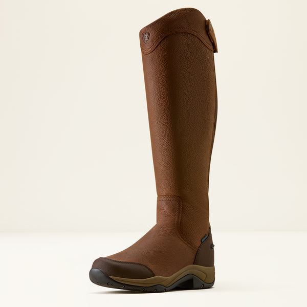 A single brown leather riding boot shown in profile against a clean, off-white studio background.