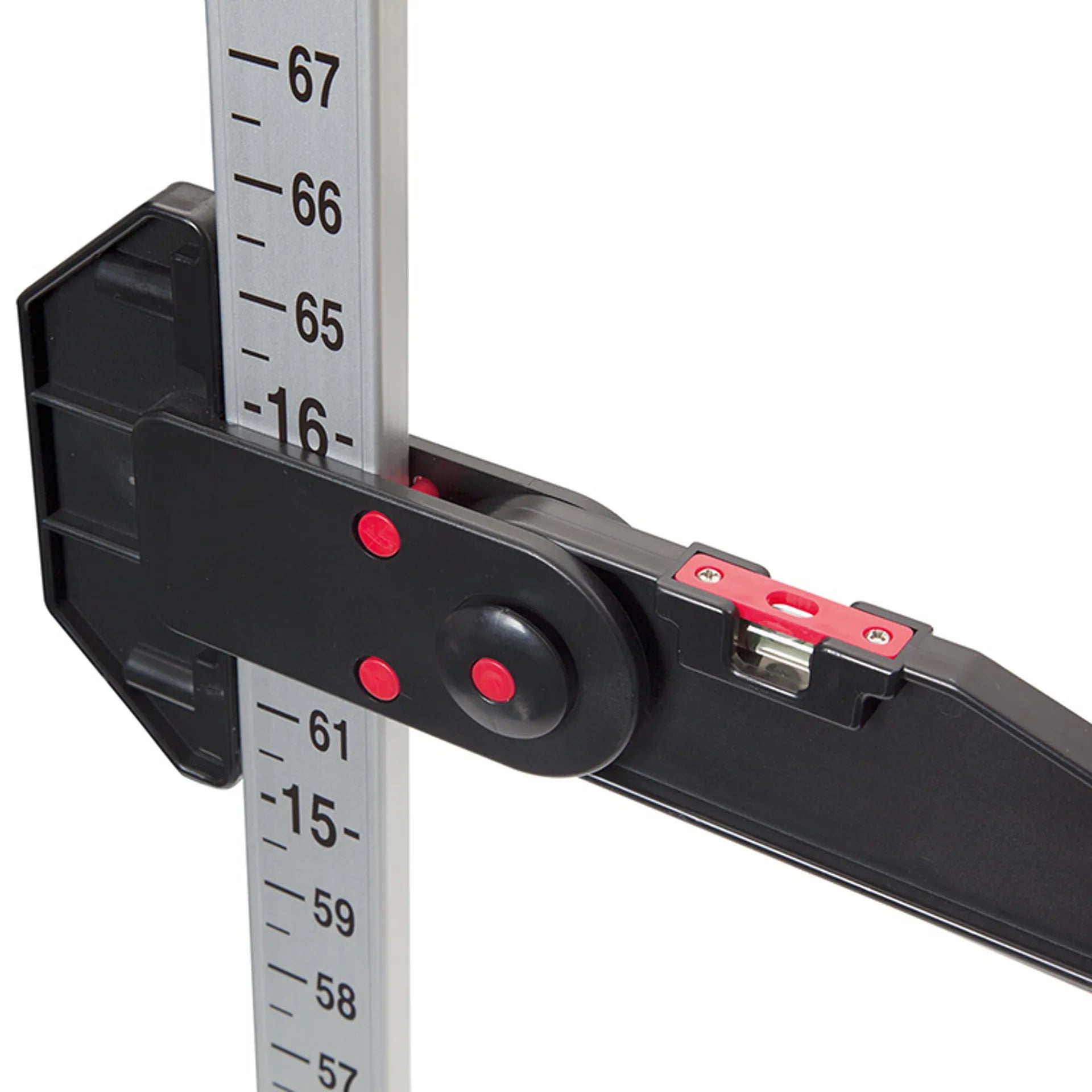 Close-up of a black and silver measuring device with red adjustment knobs and red markings, showing a vertical ruler scale on a white background.