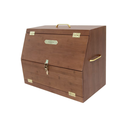 Wooden storage chest with brass hardware on a white background