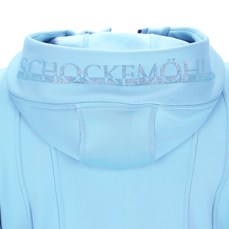 Hood of a light blue jacket with Schockemohle written across it in glitter