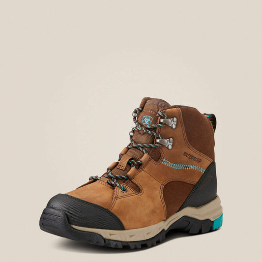 Brown hiking boot with black sole on a beige background
