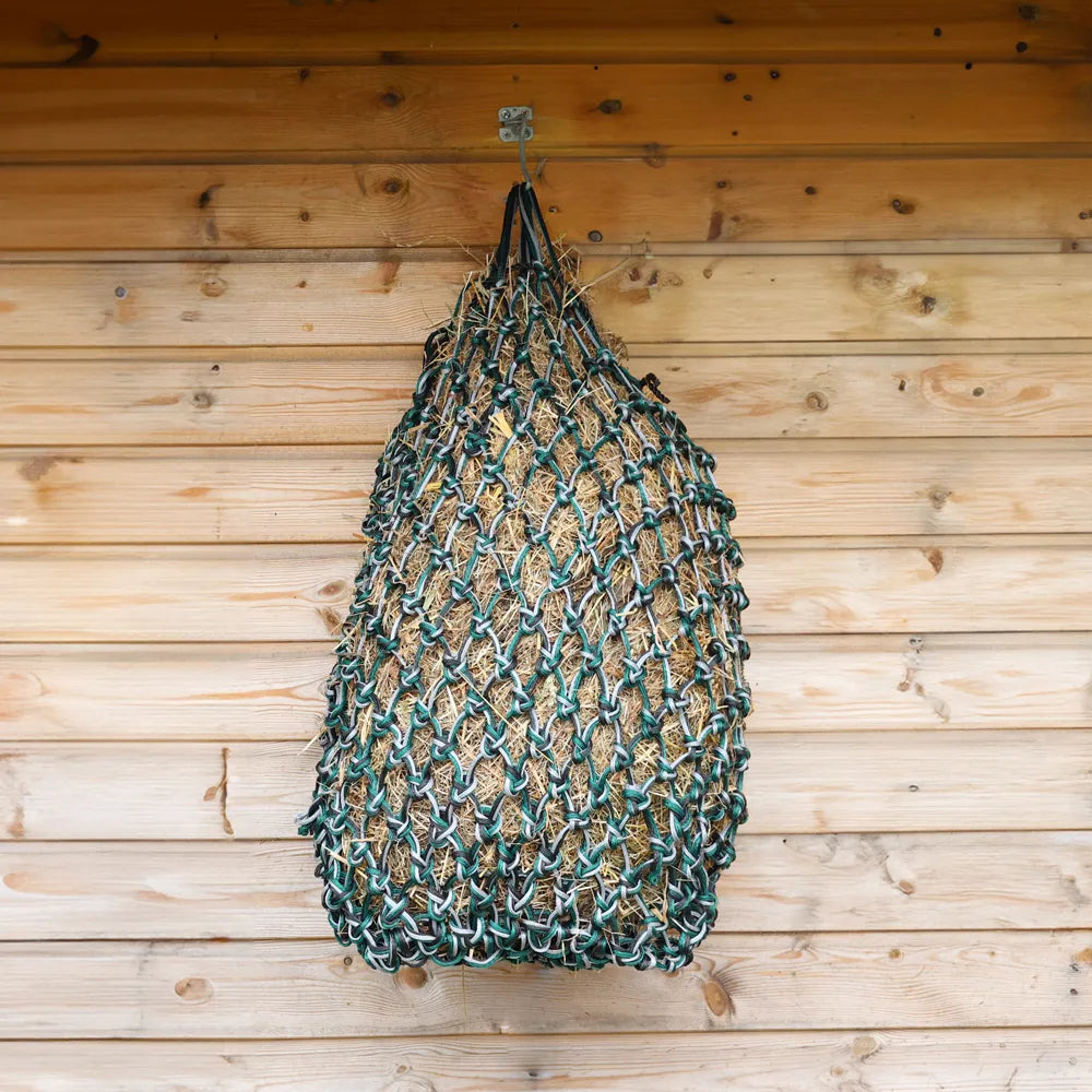 Net bag hanging on a wooden wall