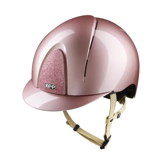 Pink helmet with crystals on a white background