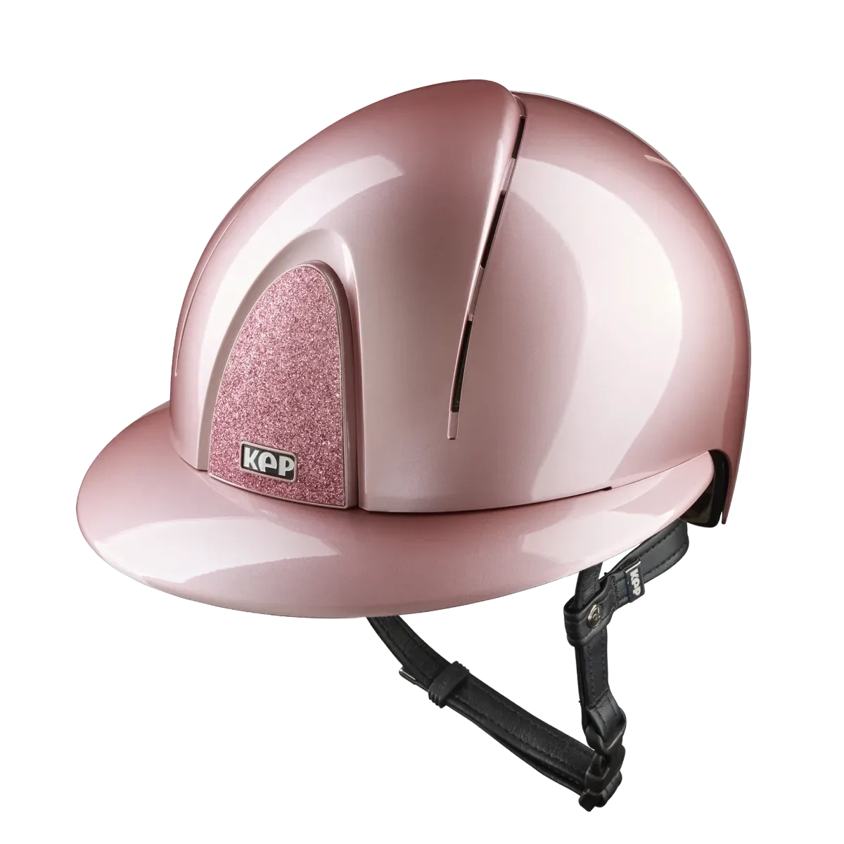 A shiny light pink equestrian riding helmet with a glittery pink cheek pad and a black chin strap, shown on a solid white background.