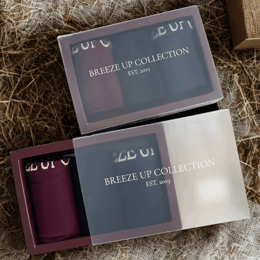 Product packaging with 'Breeze Up Collection' branding on a textured surface