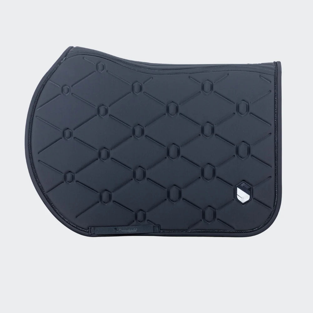 Grey quilted saddle pad on a light gray background