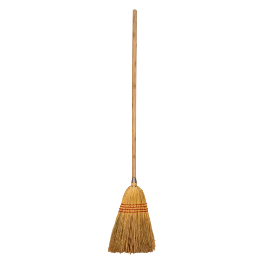Traditional broom with a wooden handle on a white background