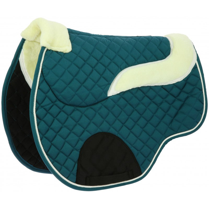 Blue saddle pad with sheepskin lining on a white background
