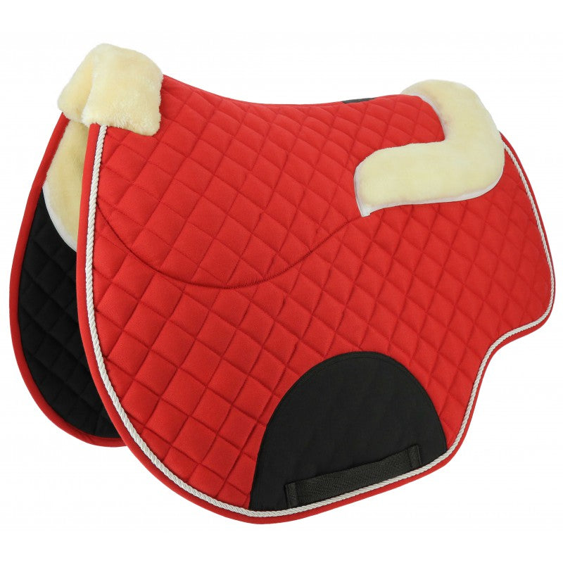 Red saddle pad with sheepskin lining on a white background