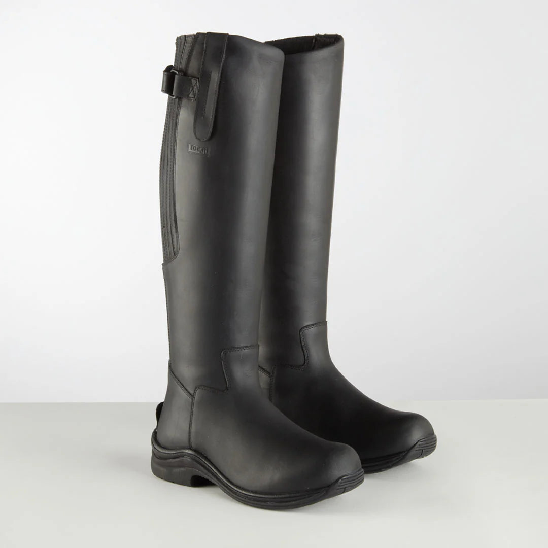 Pair of black long riding boots on a white background