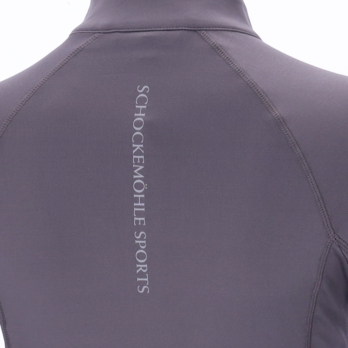 Chocolate baselayer back with Schockemohle writing on a white background