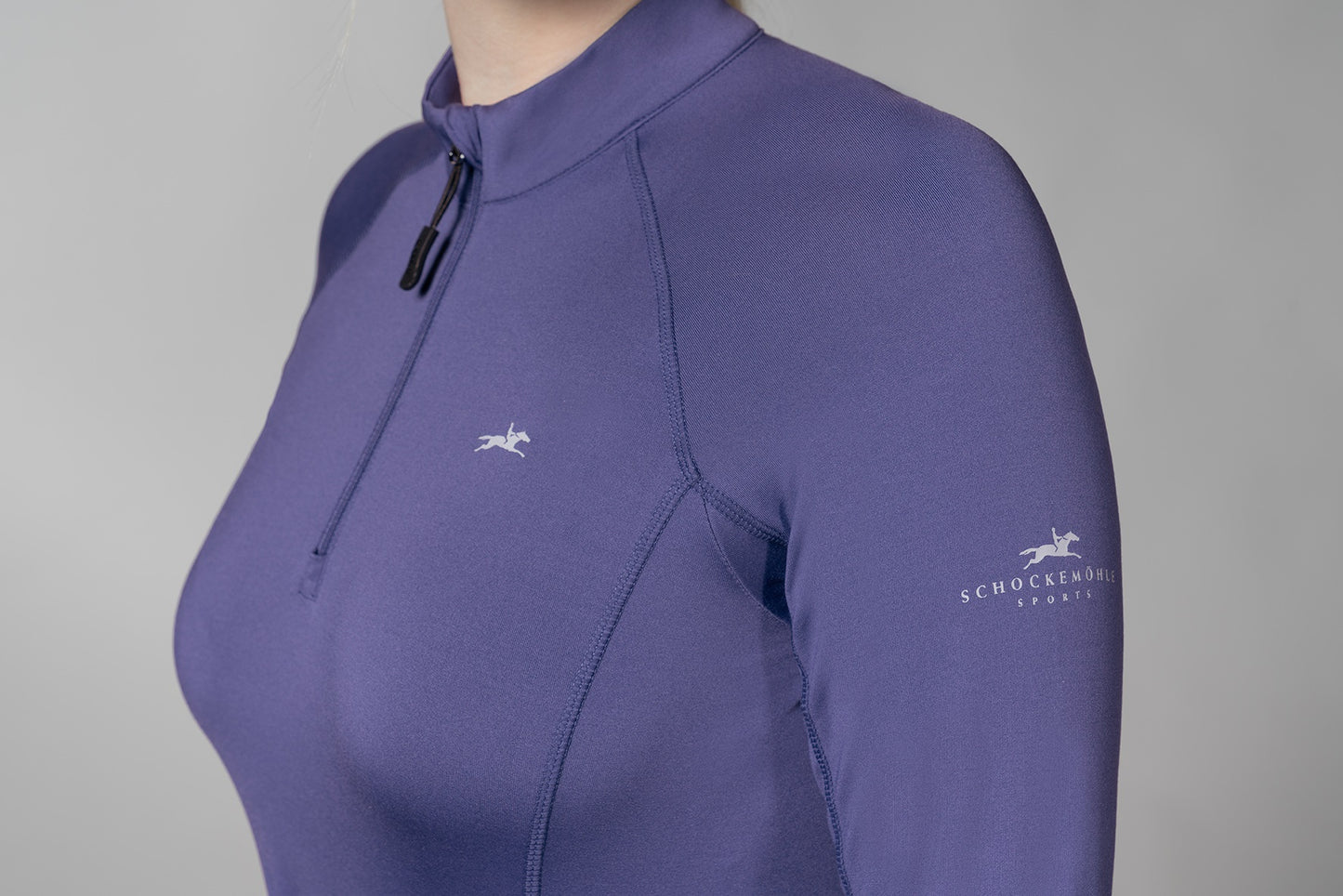 Blue baselayer with horse logo on a white background