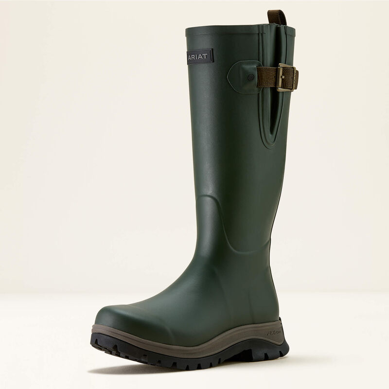 Green rubber boot with a buckle on a beige background