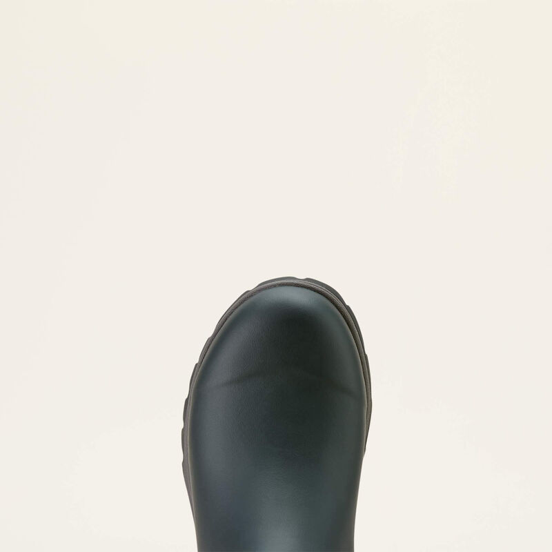 Dark navy rubber boot on a light beige background